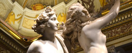 Looking up at ancient sculptures during a visit to an archaeology museum in Rome, Italy