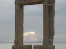 Looking through the Portara of Naxos in Greece towards the sea