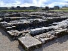 Roman wall foundations at the fort of Vindolanda on Hadrian's Wall in England