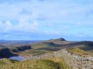 View west from Hotbanks Crags via Crag Lough and Steel Rigg to Winshields Crags on Hadrian's Wall in England