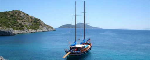 The Gulet Gemibasi in a beautiful bay on the turquoise coast of Turkey