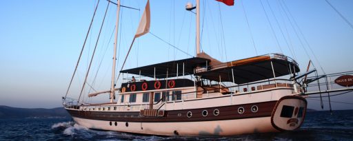 Wide shot of the gulet Oguz Bey travelling in Turkey