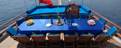 Table and seating area at the stern of the Turkish gulet Sunworld 8