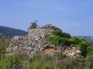 a stone shelter on the Stari Grad plain