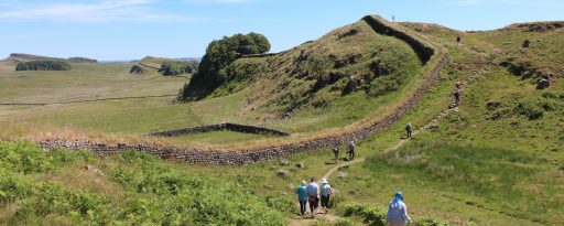Small group walking Hadrian's Wall near Steel Rigg in England
