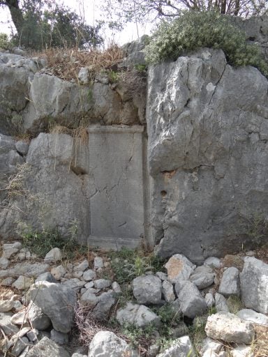 Ancient inscription cut into the rock at Phoenix in Carian, Turkey