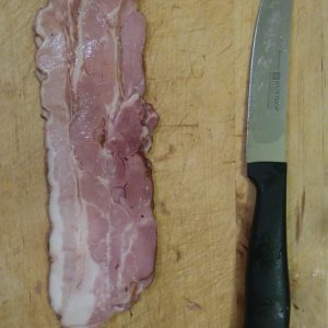 Before step 1: you know what you have to do, don't you? I hope the image is sharp enough! The next picture would show this same bacon diced by this same knife. You can probably imagine that. If you can't, you really need to consider a more basic introduction to cooking. Trust me, this is easy...  