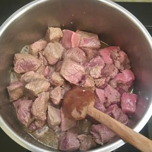 Step 2: the meat is beginning to brown.