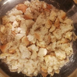 Step 1: the crumbled rusk is soaked in lukewarm water.