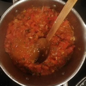 Step 3: tomato sauce a-cooking.