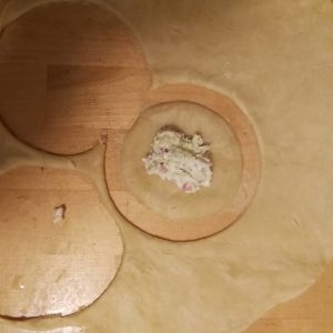 And step 5: Placing the filling, spoon by spoon.