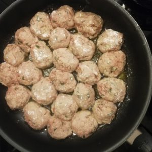 Step 6a: the polpette are beginning to fry. I'd reccommend packing them a bit less tight than I did here!