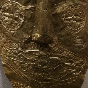 Detail of the gold mask covering the face of the lady in Grave 458.