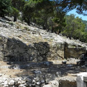 The bouleuterion or council chamber, with the footings for the rows of seats cut into the bedrock.