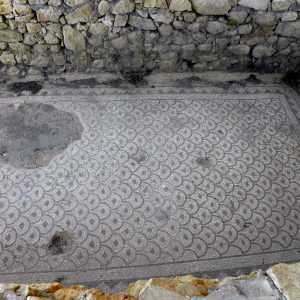 A Late Roman mosaic with a geometric pattern.