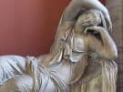 Mid shot of the ancient Roman statue of the Sleeping Ariadne in the Vatican museum in Rome