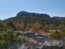 Nakovana Grad in Croatia with an ancient burial tumulus in the foreground