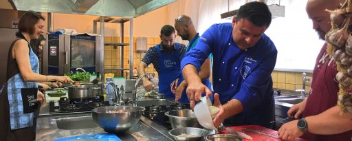Small group taking part in a cooking course on a gastronomic tour in Split, Croatia