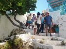 group exploring the lanes of Astypalaia town in Greece