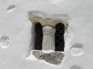 Hellenistic or Roman pillar built into the window of a chapel on Astypalea, Greece