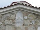 A palmette from a Classical grave marker and part of an Ionic column capital, built into a church at Chaironeia, Central Greece