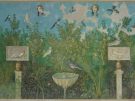 One of the three frescoed walls of a dining room which opened onto the garden at the House of the Golden Bracelet, Pompeii. The plants and birds shown are so detailed that they can be identified as particular species. Painted as if hanging from above are theatrical masks, and below there are ‘herms’ (pillars with heads) holding plaques with relief sculptures – all things that might have adorned real gardens.