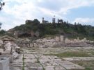 The paved square outside the sanctuary of Eleusis, with the great propylon (gatehouse) in the middle and the