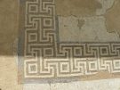Detail of a mosaic in the courtyard of a private house,