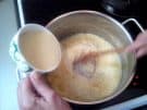 Semolina being cooked in olive oil to make Greek halva