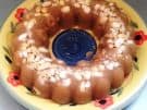 Traditional Greek semolina halva served on a floral plate
