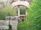 Part of the Sacred Gate, with an arched tunnel (in its Roman incarnation) permitting the river Eridanos to leave the city.