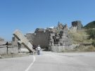 View of the Arcadian Gate, with it massive broken inner lintel, and part of the walls in Messene in the Peloponnese in Greece