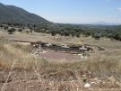 View of the ancient theatre, the Early Byzantine Church and the agora of Messene, in the Peloponnese in Greece.