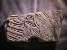 Fragment of the wing of one of the sphinxes, found in the inner chamber. (Image: Greek Ministry of Culture)