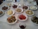 The makings of a fest: local specialities served at lunch in the Lasithi mountains on our Explring Crete tour.