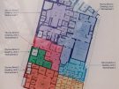 Plan of Terrace House 2 on display at the entrance, with the seven (originally six) residential units marked in different colours.