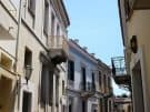 Survivors: Late 19th and early 20th century Neoclassical houses in Plaka, the Old Town (Image by Wikimedia User Joanbanjo).