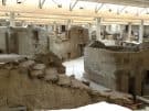 3600 year old houses around a small square in the Bronze Age town of Akrotiri on Santorini