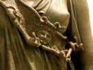 The head of Medusa as part of Athena’s aegis on the extraordinary 4th century BC Piraeus Athena, a fully preserved bronze statue of the goddess.