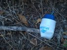 a discarded disposable frappé shaker in the Greek countryside