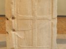 an ancient marble slab with a Christian cross relief from the Parthenon in Athens, Greece