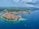 Aerial view of the old town of KorÄŤula in Croatia and its surrounding seascape