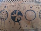 Images of warrios on an ancient Greek amphora in the Parikia museum on Kos in Greece