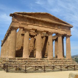 Ancient Greek Doric temple, known as the Temple of Concord, set against a blue sky, from the ancient city of Akragas, modern Agrigento on the island of Sicily