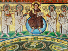 A 6th-century golden Byzantine mosaic from the Euphrasian Basilica in Poreč, Croatia. It depicts a youthful, beardless Christ seated on a blue celestial globe, holding an open book with the Latin text