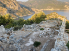 Looking down into the upper Byzantine church on the island of Gemiler on the Lycian coast of Turkey, with sunlit hills behind