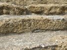 The dedicatory inscription on the theatre’s seating: ‘Archelas son of Eucleidas, to Dionysus’