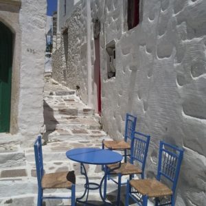 Inviting: typical Greek café table and chairs in a lane in Amorgos Chora.