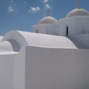The whitewashed chapels, dominated by simple bodies of cubes and domes, are a typical feature of traditional Cycladic architecture.
